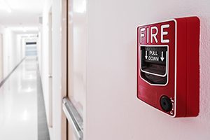 Fire alarm "Pull Down" panel on a wall